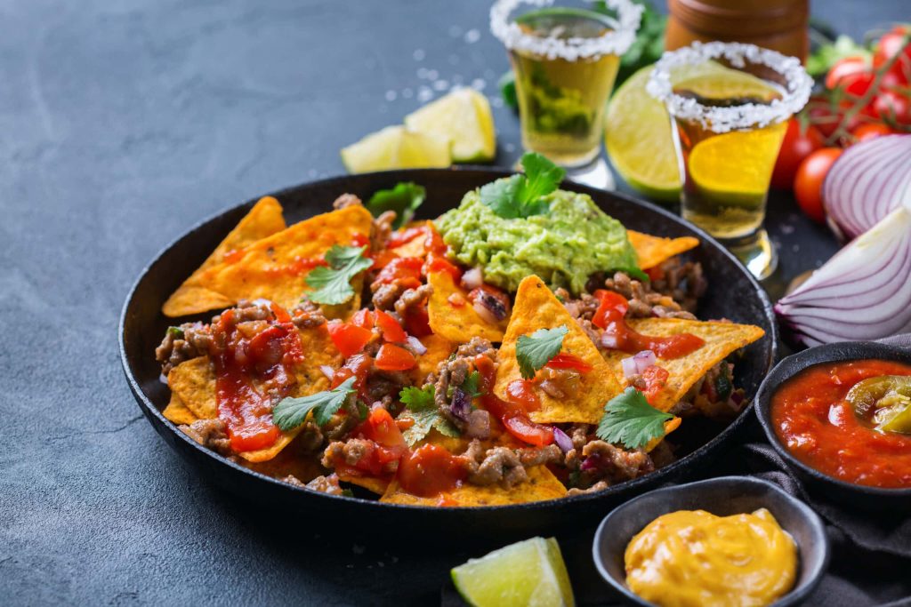 chips nachos with beef guacamole chili cheese